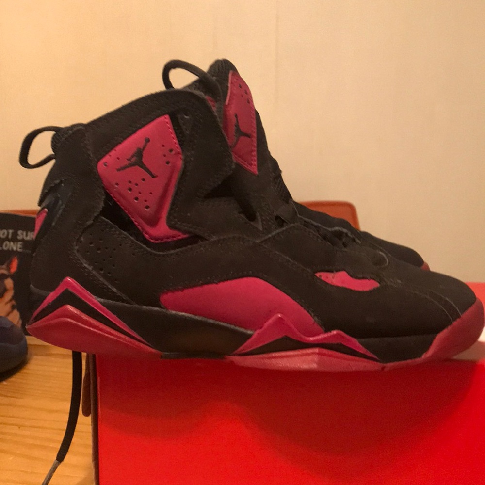 Air Jordan’s size 4 1/2 black and pink